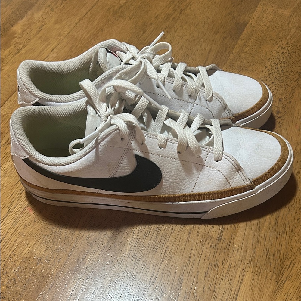 Nike White Sneakers with Black Swoosh and Brown Trim